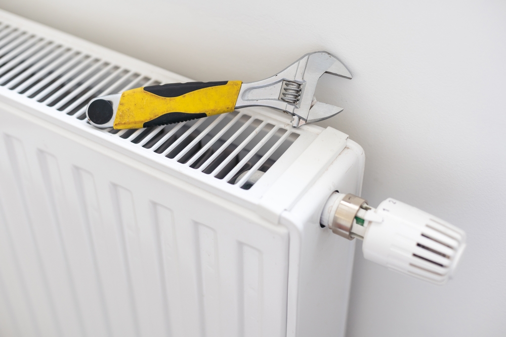 heating system and repair tool
