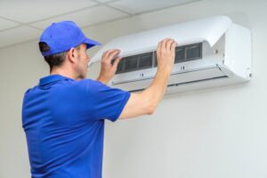 technician performing hvac repair